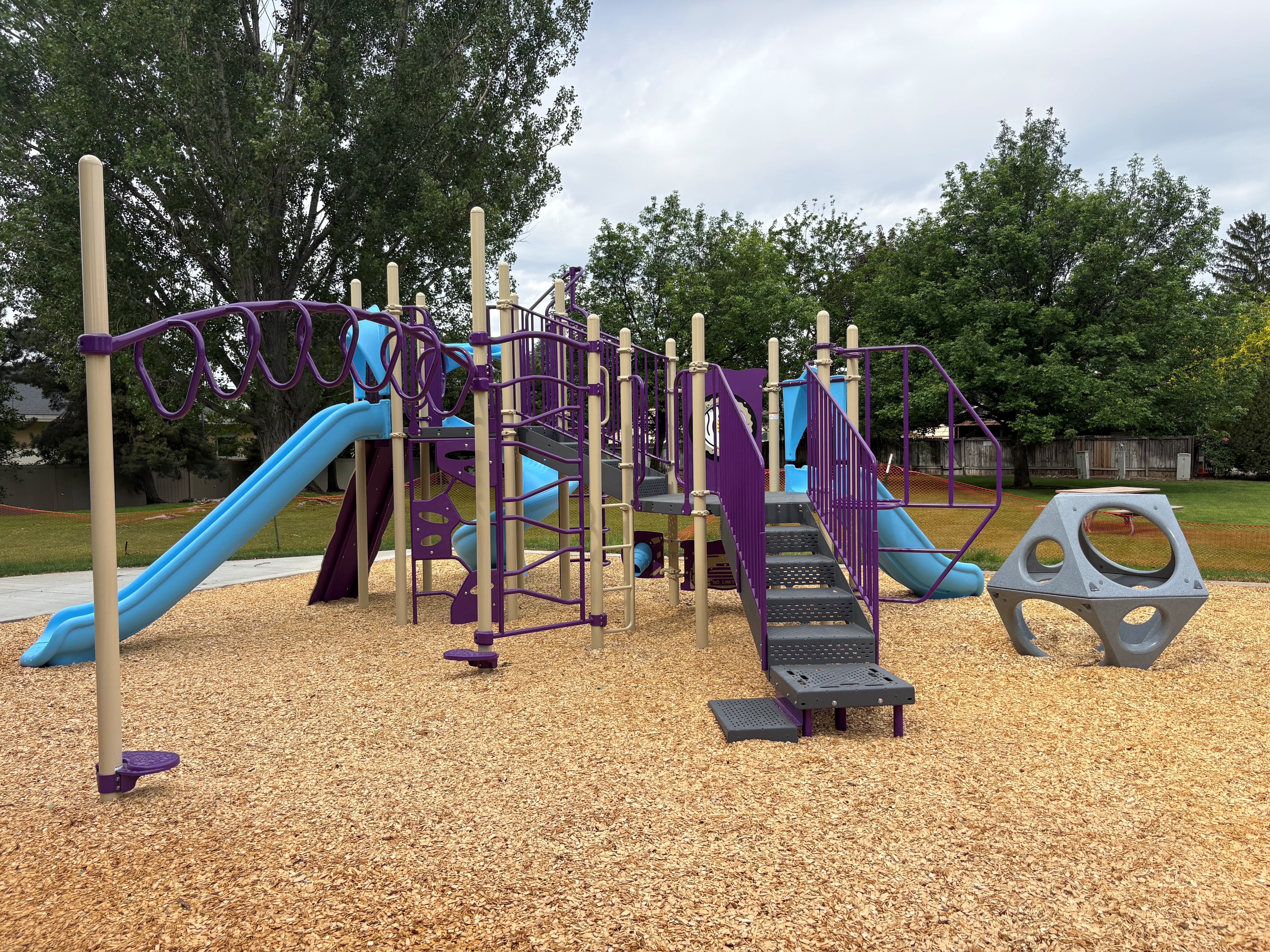New Playground at Tammy Street Park including rings, slides, and other amenities.